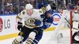 Boston Bruins defenseman Mason Lohrei, Toronto Maple Leafs forward John Tavares
