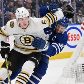 Boston Bruins defenseman Mason Lohrei, Toronto Maple Leafs forward John Tavares