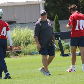 New England Patriots quarterbacks Jacoby Brissett, Drake Maye and offensive coordinator Alex Van Pelt