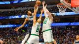 Dallas Mavericks forward Derrick Jones Jr. and Boston Celtics forward Luke Kornet