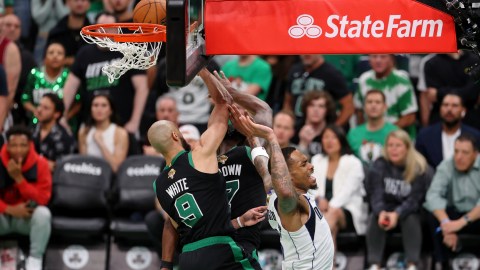 Boston Celtics guard Derrick White and Dallas Mavericks forward PJ. Washington
