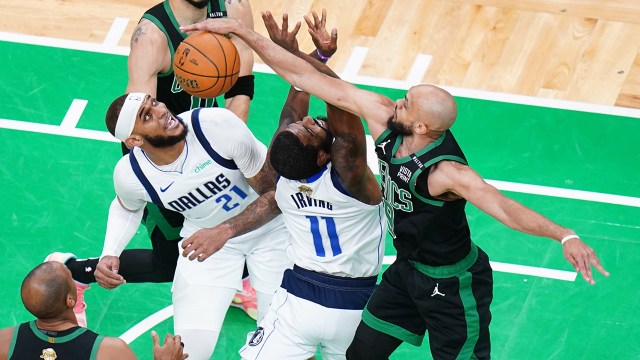 Boston Celtics guard Derrick White blocks Dallas Mavericks guard Kyrie Irving