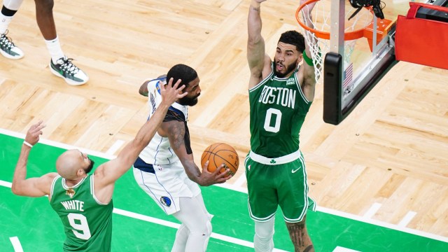 Boston Celtics teammates Jayson Tatum and Derrick White, and Dallas Mavericks guard Kyrie Irving