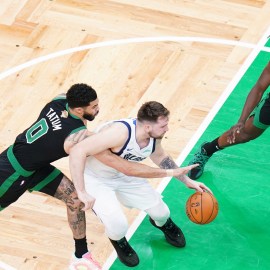 Boston Celtics teammates Jayson Tatum and Jrue Holiday, and Dallas Mavericks guard Luka Doncic