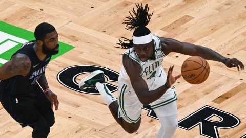 Boston Celtics guard Jrue Holiday and Dallas Mavericks guard Kyrie Irving