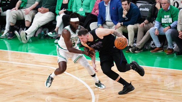 Dallas Mavericks guard Luka Doncic and Boston Celtics guard Jrue Holiday