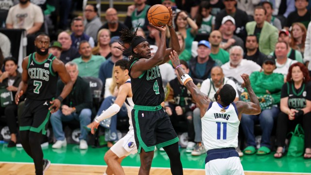 Boston Celtics guard Jrue Holiday and Dallas Mavericks guard Kyrie Irving