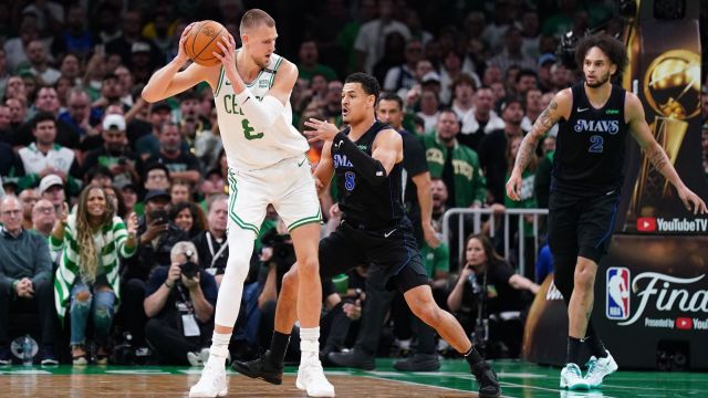 Boston Celtics center Kristaps Porzingis and Dallas Mavericks guard Josh Green