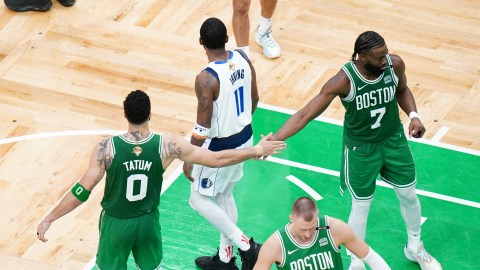 Boston Celtics teammates Jayson Tatum and Jaylen Brown and Dallas Mavericks guard Kyrie Irving