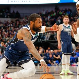 Dallas Mavericks guard Kyrie Irving and Boston Celtics guard Jrue Holiday