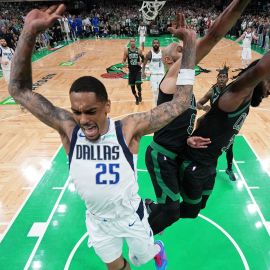 Dallas Mavericks forward P.J. Washington and Boston Celtics guards Jaylen Brown and Derrick White