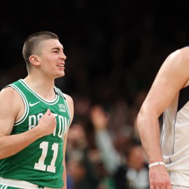 Boston Celtics guard Payton Pritchard and Dallas Mavericks guard Luka Doncic
