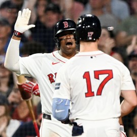 Boston Red Sox teammates Rafael Devers and Tyler O'Neill