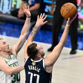 Boston Celtics guard Sam Hauser and Dallas Mavericks guard Luka Doncic