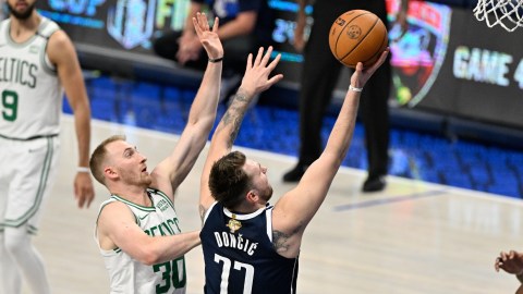 Boston Celtics guard Sam Hauser and Dallas Mavericks guard Luka Doncic