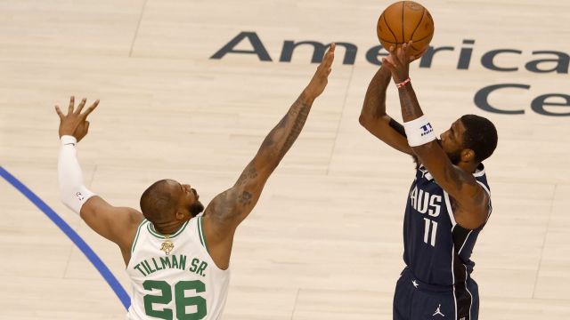 Boston Celtics forward Xavier Tillman and Dallas Mavericks guard Kyrie Irving