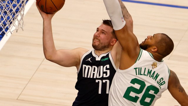 Boston Celtics forward Xavier Tillman and Dallas Mavericks guard Luka Doncic