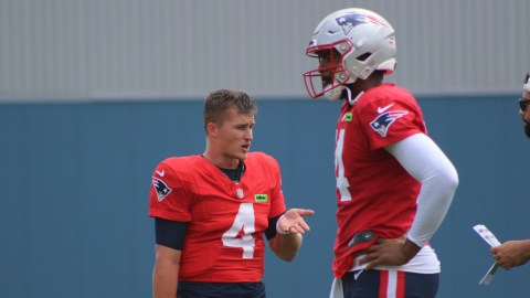 New England Patriots quarterbacks Bailey Zappe, Jacoby Brissett