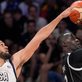 USA guard Derrick White and South Sudan forward Majok Deng