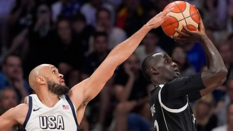 USA guard Derrick White and South Sudan forward Majok Deng