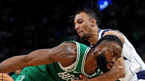 Boston Celtics guard Jaylen Brown and Dallas Mavericks guard A.J. Lawson