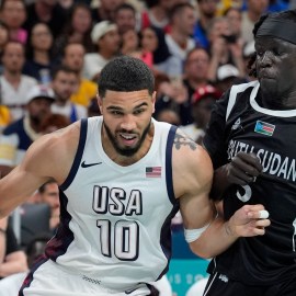 USA forward Jayson Tatum and South Sudan forward Nuni Omot