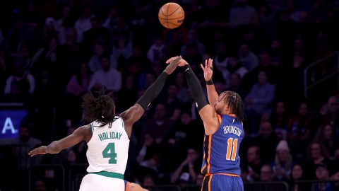 Boston Celtics guard Jrue Holiday and New York Knicks guard Jalen Brunson