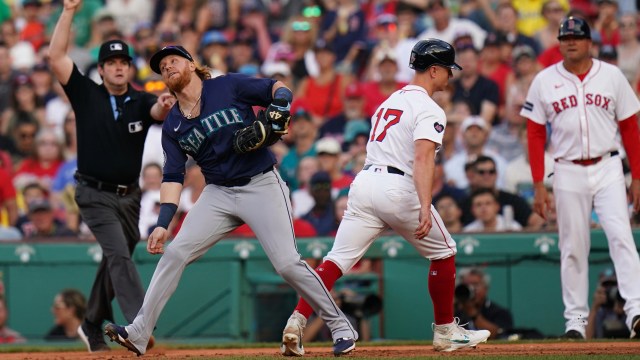 Boston Red Sox outfielder Tyler O'Neill and Seattle Mariners first baseman Justin Turner