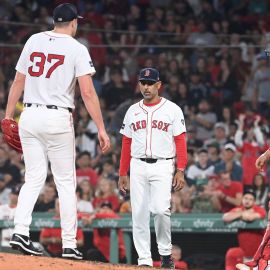Boston Red Sox pitcher Nick Pivetta, manager Alex Cora and catcher Connor Wong