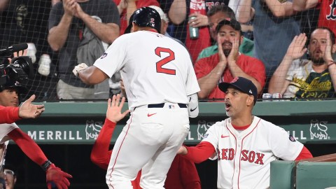 Boston Red Sox first baseman Dominic Smith, manager Alex Cora