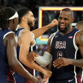 Boston Celtics teammates Jayson Tatum, Jrue Holiday and Los Angeles Lakers forward LeBron James