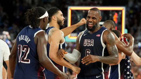 Boston Celtics teammates Jayson Tatum, Jrue Holiday and Los Angeles Lakers forward LeBron James