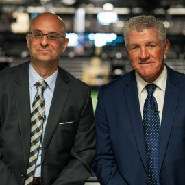 Boston Bruins announcers Judd Sirott and Andy Brickley