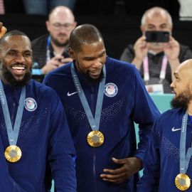 Team USA teammates LeBron James, Kevin Durant and Derrick White