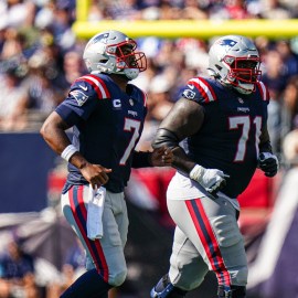 New England Patriots quarterback Jacoby Brissett and offensive lineman Mike Onwenu