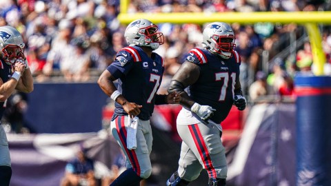 New England Patriots quarterback Jacoby Brissett and offensive lineman Mike Onwenu