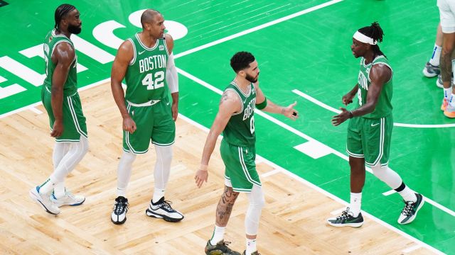 Boston Celtics forward Jayson Tatum and guard Jrue Holiday