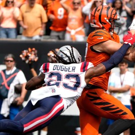 New England Patriots safety Kyle Dugger, Cincinnati Bengals tight end Tanner Hudson