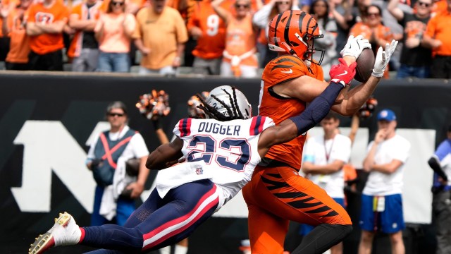 New England Patriots safety Kyle Dugger, Cincinnati Bengals tight end Tanner Hudson