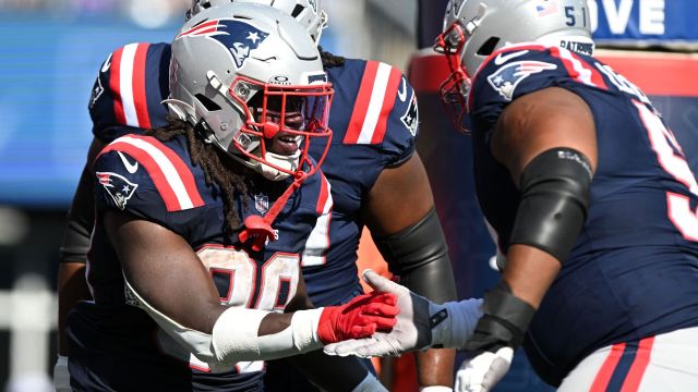 New England Patriots running back Rhamondre Stevenson and offensive lineman Nick Leverett