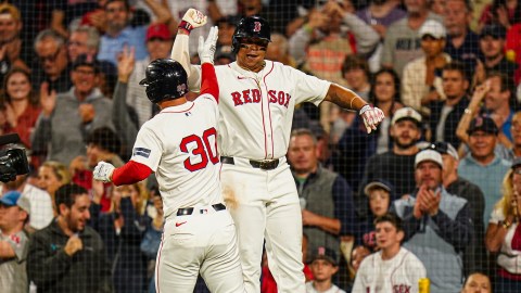 Boston Red Sox teammates Rob Refsnyder and Rafael Devers