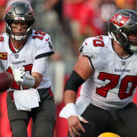 Former NFL quarterback Tom Brady and Tampa Bay Buccaneers offensive lineman Robert Hainsey