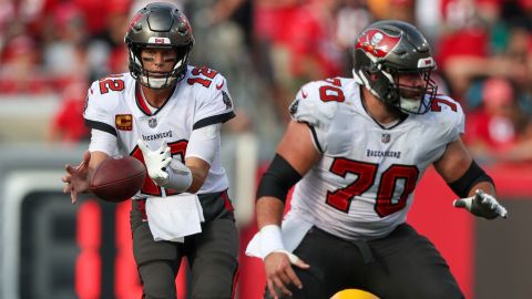 Former NFL quarterback Tom Brady and Tampa Bay Buccaneers offensive lineman Robert Hainsey