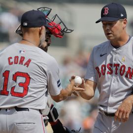 Boston Red Sox manager Alex Cora and pitcher Rich Hill