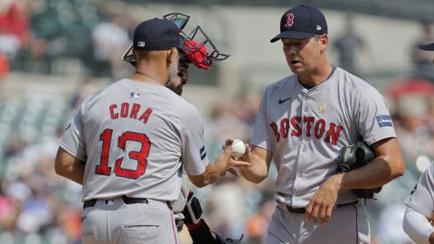 Boston Red Sox manager Alex Cora and pitcher Rich Hill