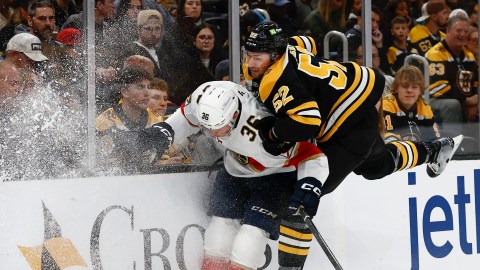 Boston Bruins defenseman Andrew Peeke and Florida Panthers forward Patrick Giles