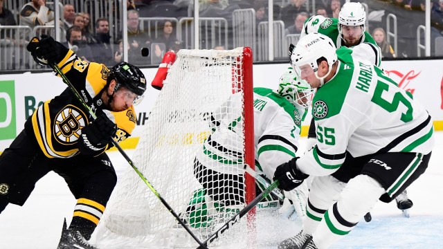 Boston Bruins forward Brad Marchand and Dallas Stars defenseman Thomas Harley