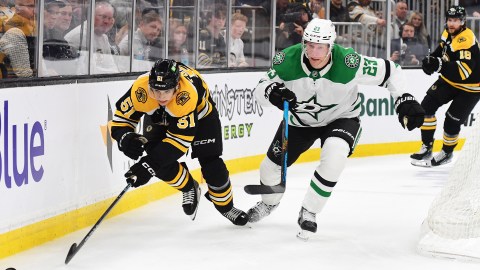 Bruins center Matthew Poitras Stars defenseman Esa Lindell