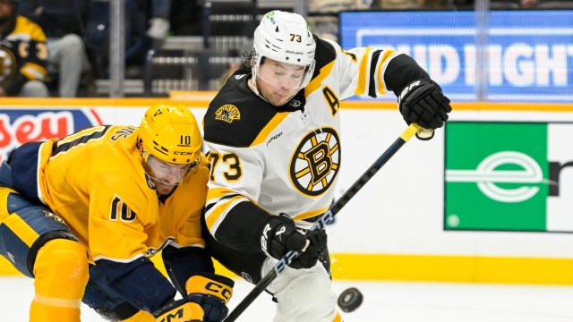 Boston Bruins defenseman Charlie McAvoy and Nashville Predators forward Colton Sissons