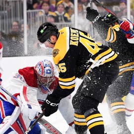 Boston Bruins forward Cole Koepke and Montreal Canadiens goaltender Cayden Primeau